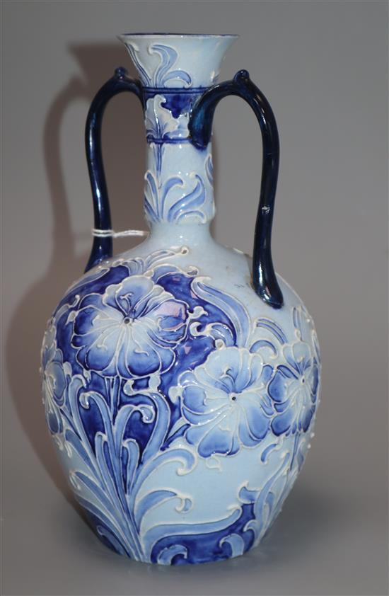 A Moorcroft Florian ware two handled vase, c.1900, H.21.5cm, one handle repaired